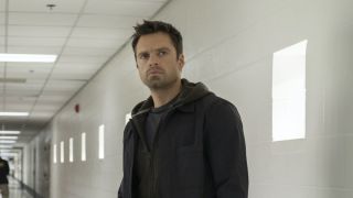 Sebastian Stan standing looking into the distance in a hospital on Falcon and the Winter Soldier.