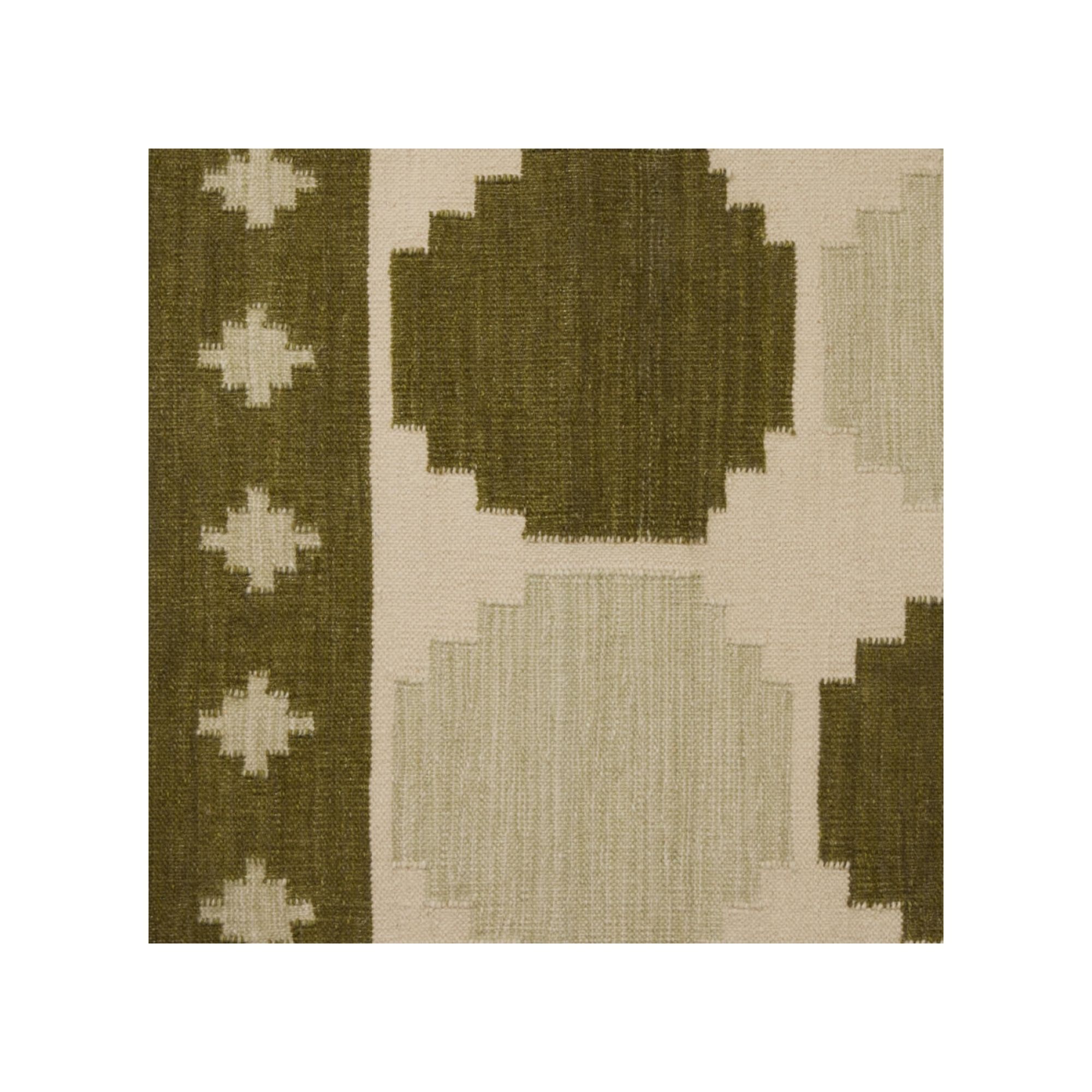 green and cream geometric rug