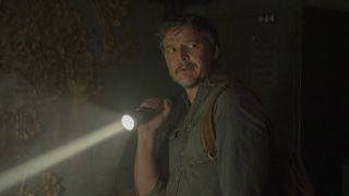 Joel with flashlight in HBO's The Last Of Us