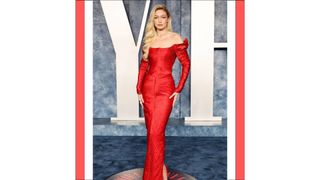 Gigi Hadid wears a red silk dress as she attends the 2023 Vanity Fair Oscar Party Hosted By Radhika Jones at Wallis Annenberg Center for the Performing Arts on March 12, 2023 in Beverly Hills, California.