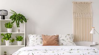 Spring time bedroom scene with a wall hanging