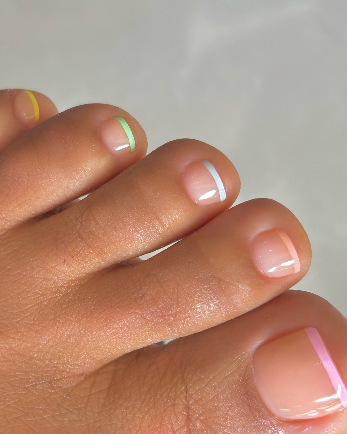 Colourful French tip pedicure