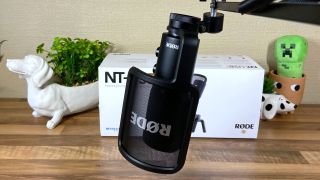 Rode NT-USB+ microphone attached to a third-party mounting arm