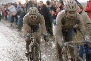 Servais Knaven and Museeuw in the mudbath that was the 2001 Paris-Roubaix