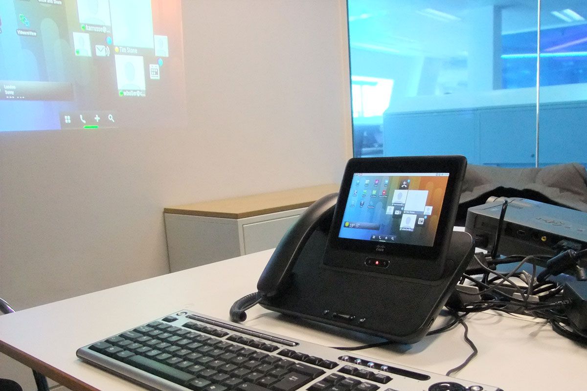 A projector connected to the Cisco Cius via its docking station