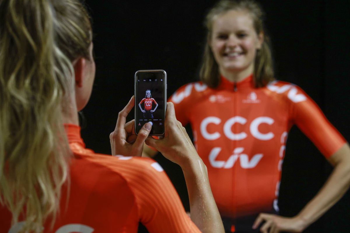 Pauliena Rooijakkers takes a picture of Jeanne Korevaar in the new CCC-Liv kit
