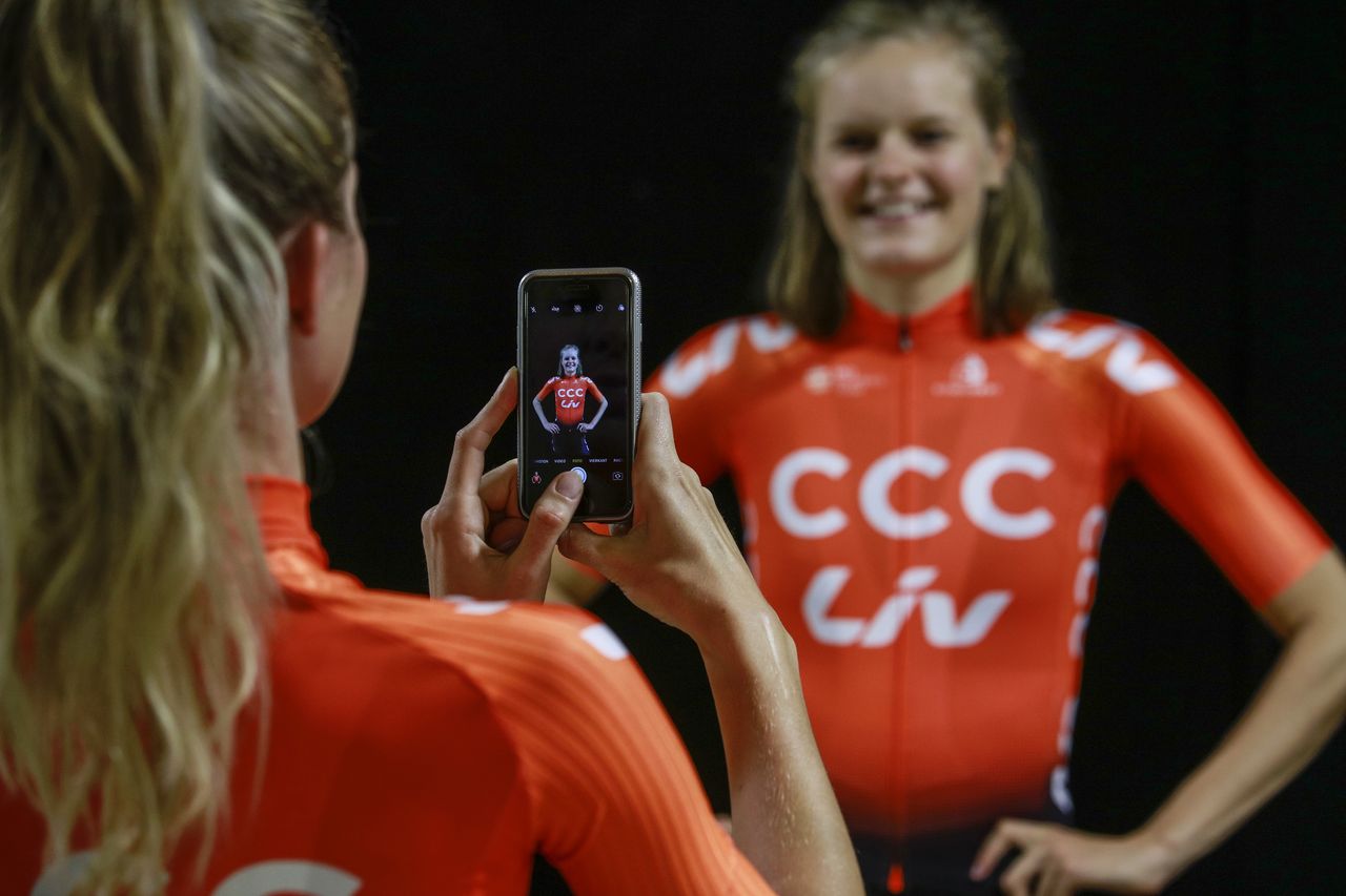 Pauliena Rooijakkers takes a picture of Jeanne Korevaar in the new CCC-Liv kit