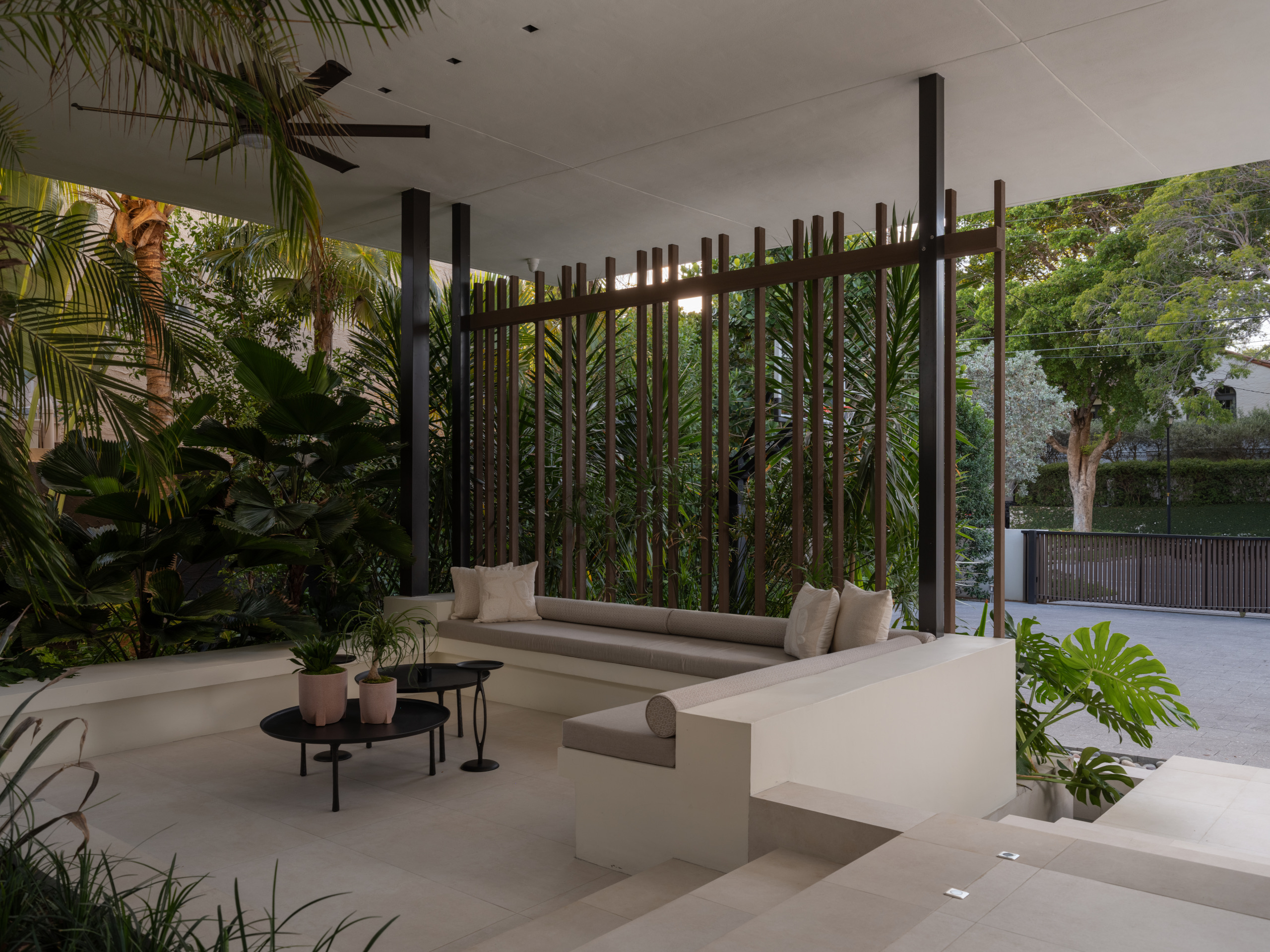 A seating area adjacent to the internal terrace, beneath the bedroom wing