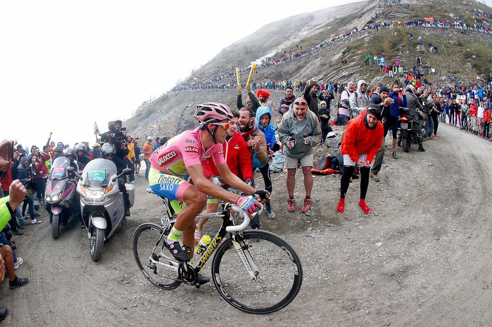 Alberto Contador rounds a corner on the dirt track.