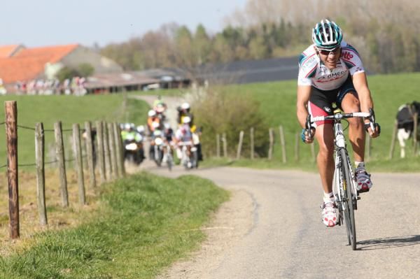 Philippe Gilbert struck out on his own, too, but saved enough to later win the sprint.