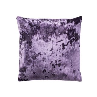 A crushed purple pillow