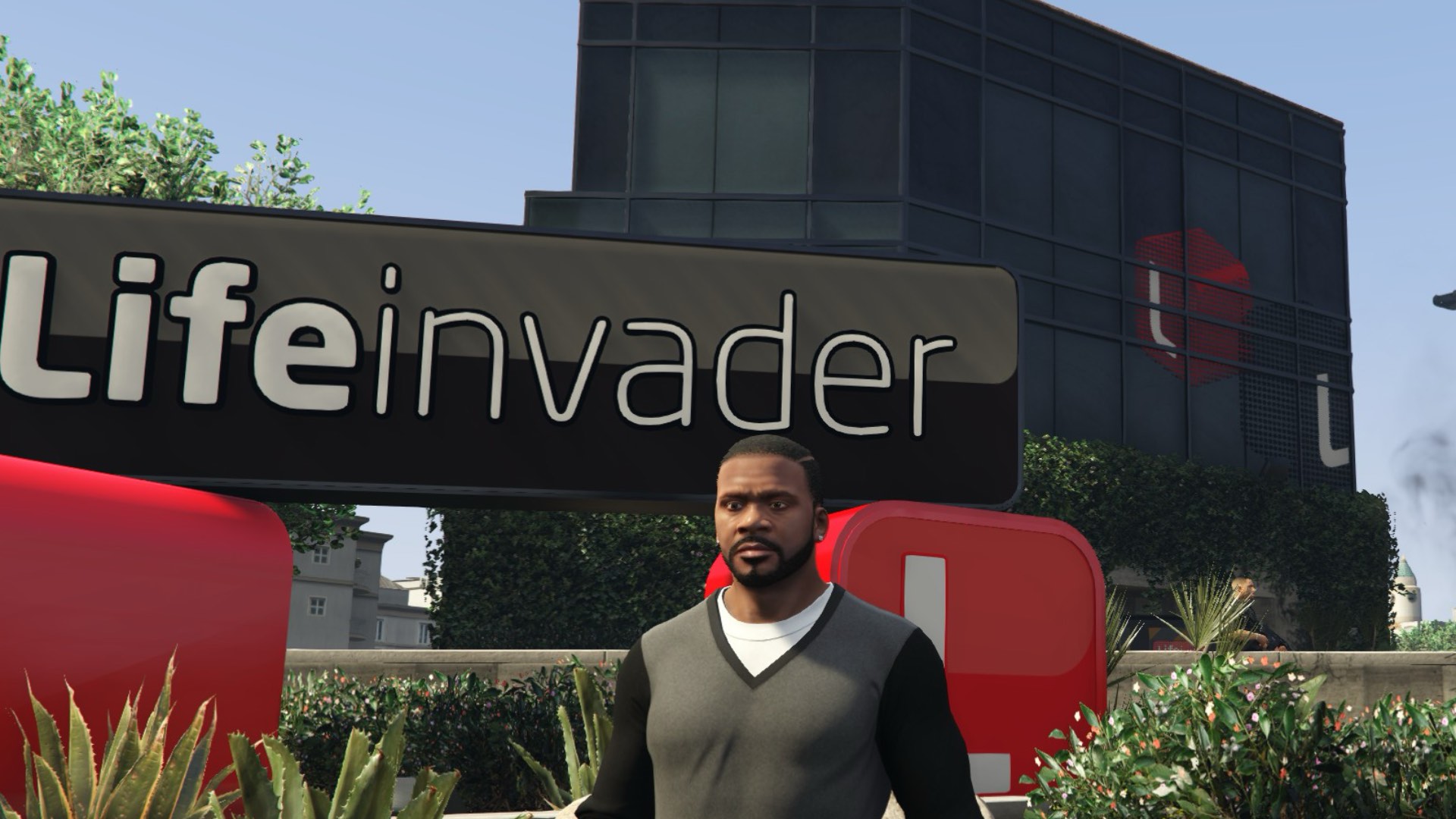 Franklin stands in front of the LifeInvader building.