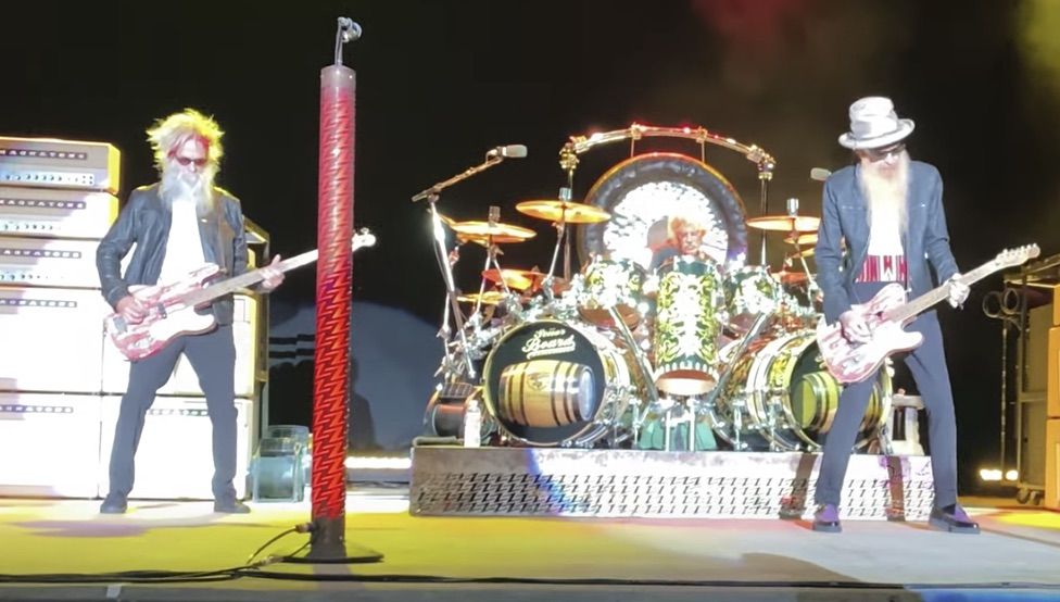 (from left) ZZ Top&#039;s Elwood Francis, Frank Beard, and Billy Gibbons perform live at at the Tuscaloosa Amphitheater in Tuscaloosa, Alabama