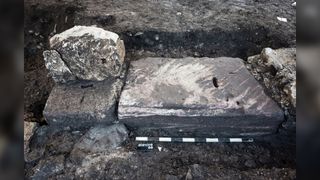 The threshold of the side entrance consists of a block of sandstone.