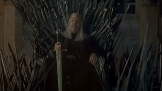 House of the Dragon trailer screenshot of Paddy Considine's Viserys on the Iron Throne.