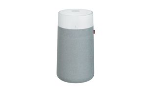 The Blue Pure 411i Max air purifier with a gray base and white top