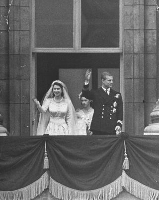 Princess Elizabeth and Prince Philip on the balcony of Buckingham Palace after their wedding. Photo by William Sumits/The LIFE Picture Collection via Getty Images.