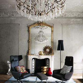 chair with chandelier and lamp