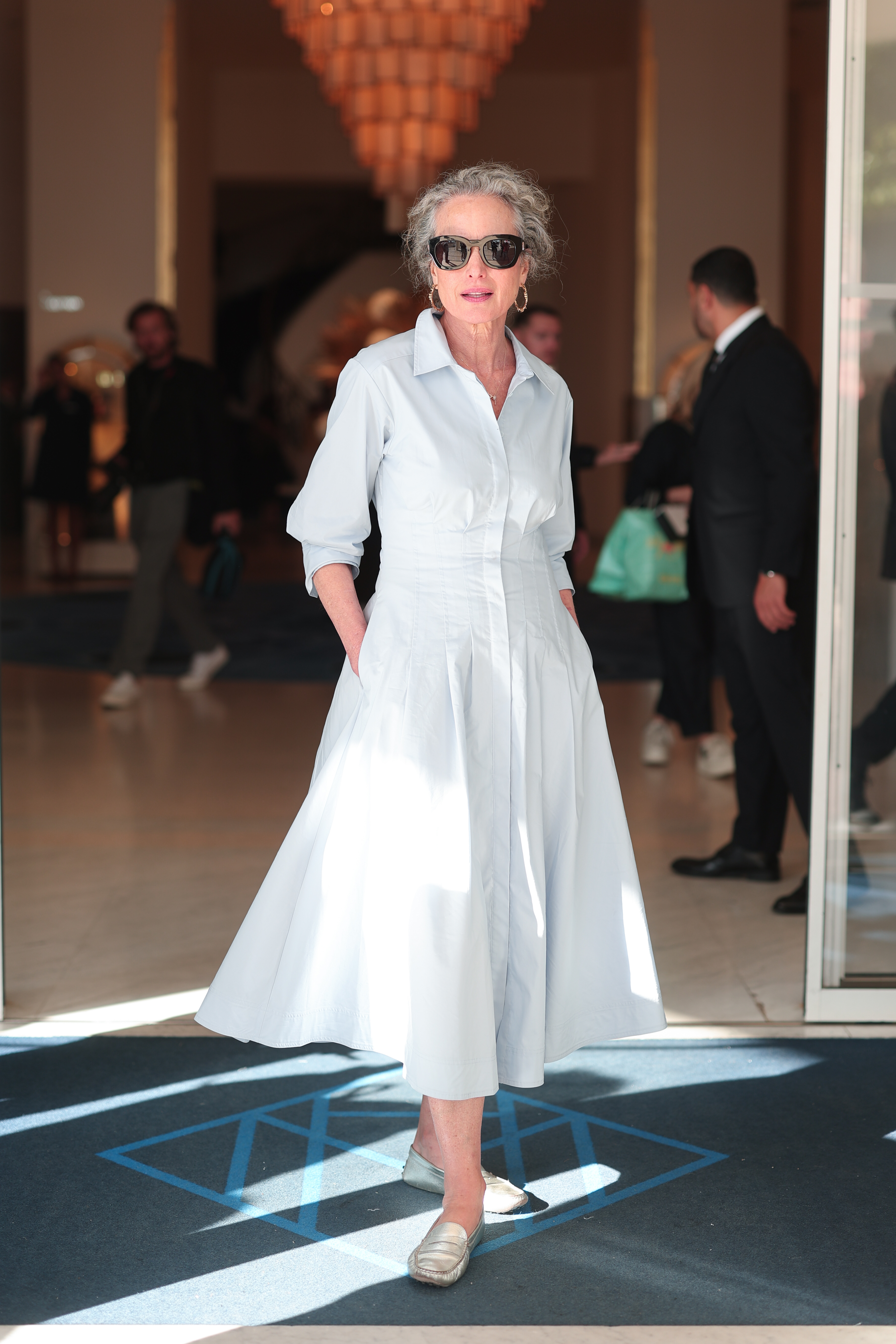An image of Andie Macdowell wearing an over over 50s French fashion trend at the 2026 Cannes Film Festival.