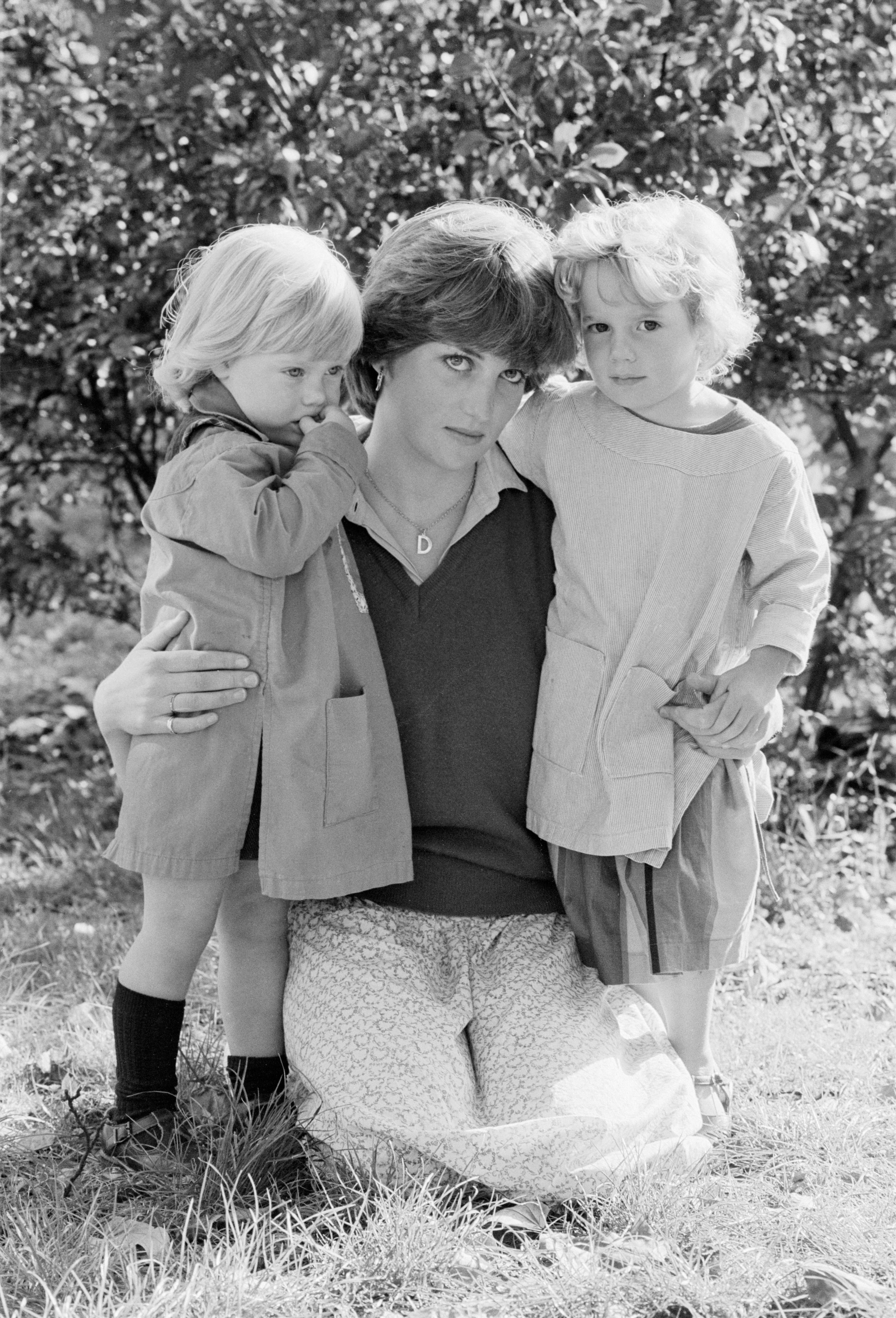 Princess Diana posing with nursery students