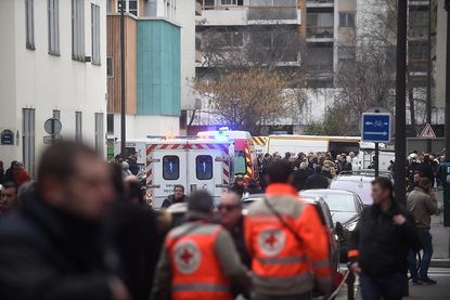 Attack on satirical Paris newspaper leaves at least 12 dead