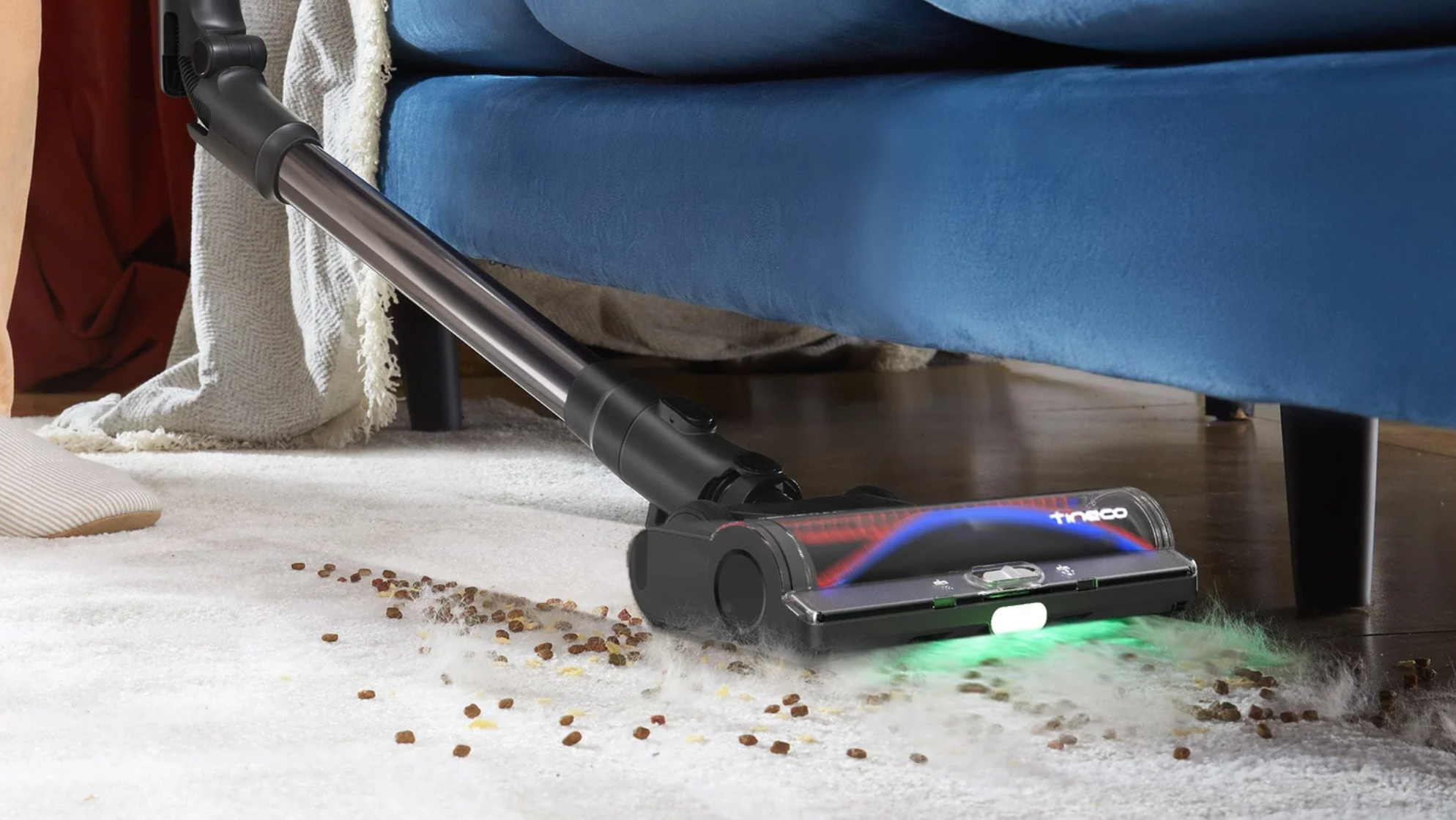 Tineco Pure One S50 Pro cordless vacuum cleaner in use on a rug