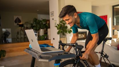 Man on indoor trainer cycling