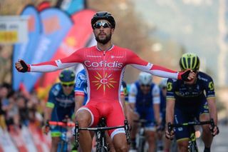Cofidis' French cyclist Nacer Bouhanni celebrates as he crosses the finish line winning the fourth stage of the 97th Volta Catalunya