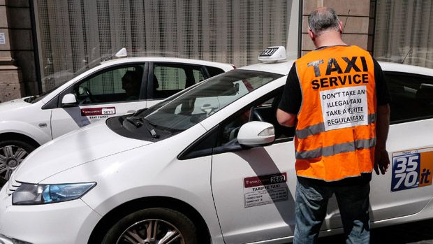 A local taxi driver protesting