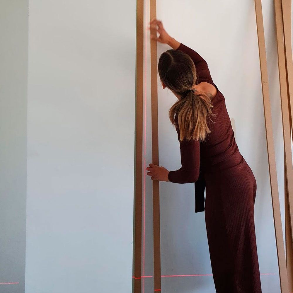 Homeowner creates stunning wood panelling feature wall on a budget