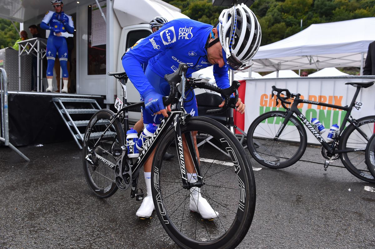 Gianluca Brambilla checks his front break