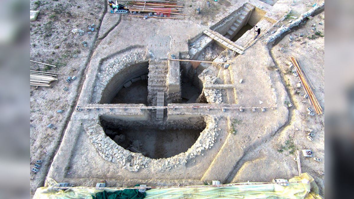 This photo shows one of the two tombs that were discovered. The tombs date back about 3,500 years and were covered with about 40,000 watermelon sized rocks to protect them against robbers. The stones had to be removed before excavations could commence.