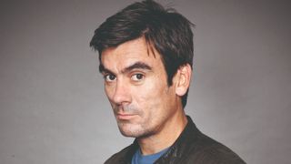 Headshot of Jeff Hordley as Emmerdale character Cain Dingle wearing a leather jacket 