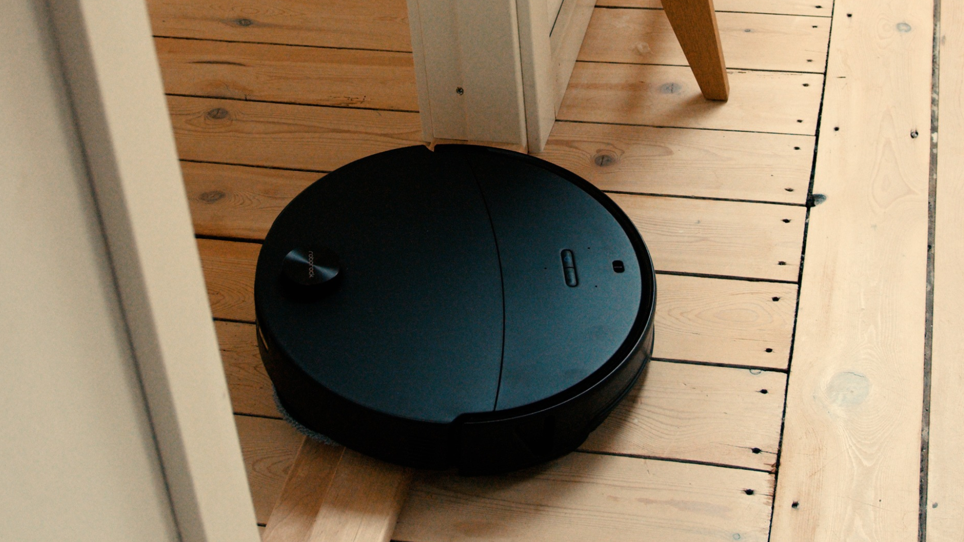 Roborock Saros 20 Neo Robot Vacuum cleaning a home around obstacles