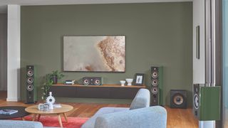 Focal Aria Evo X speakers in lifestyle home cinema setting with TV