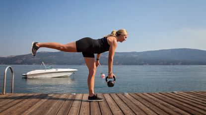 Woman exercising with a kettlebell