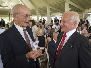 Apollo 11 Astronauts Michael Collins, left, and Buzz Aldrin talk at a private memorial service celebrating the life of Neil Armstrong, Aug. 31, 2012