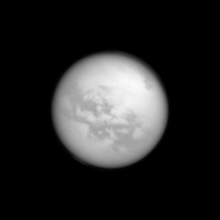 This Cassini image of Titan captured on April 13, 2013, reveals the moon's vast hydrocarbon dunes called Fensai and Aztlan.
