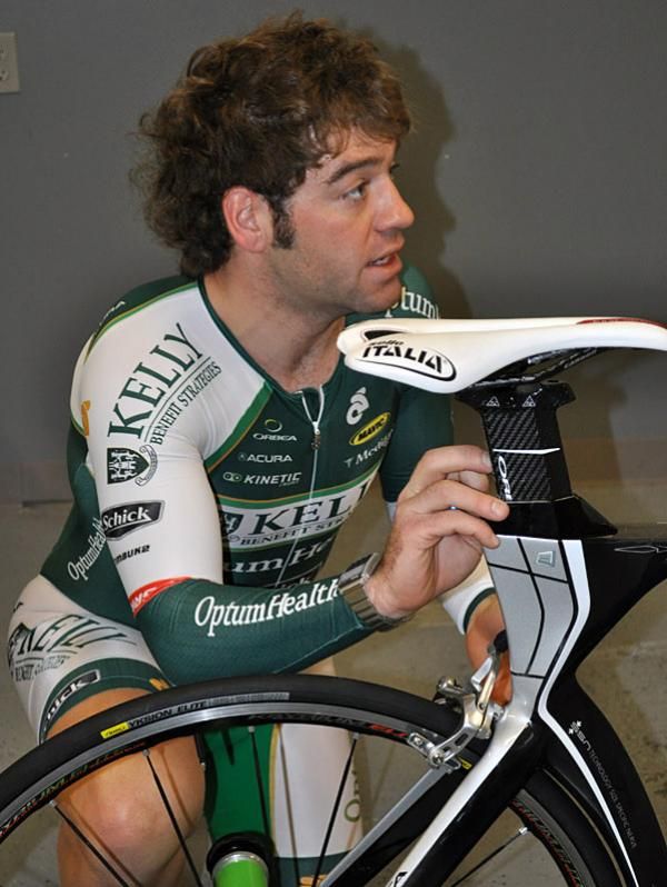 Mike Friedman makes a saddle height adjustment on his Orbea Ordu time trial bike.