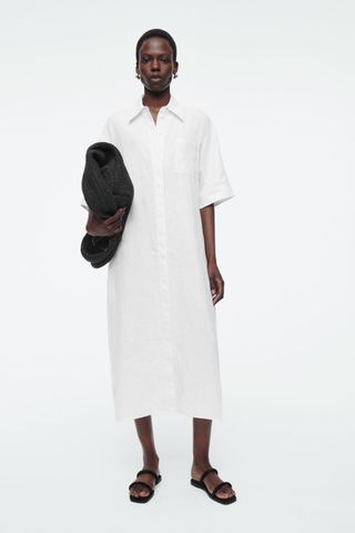 COS model wearing white linen shirt dress