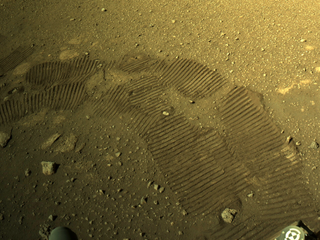 NASA's Perseverance rover's right navigation camera (Navcam) captured this image of the rover's Martian footprints on March 5, 2021.