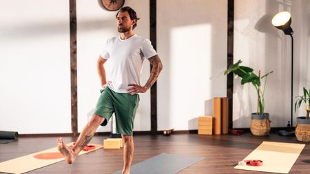 a man standing on one leg