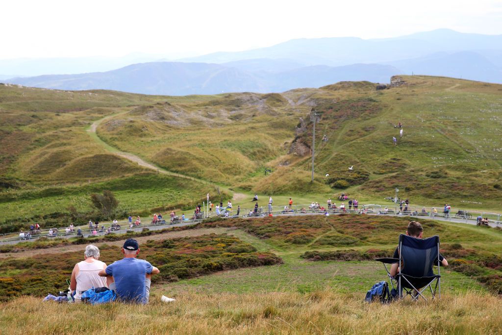 LLANDUDNO SEPTEMBER 08 Spectators waiting for the peloton at The Great Orme a limestone headland on the north coast of Wales during the 17th Tour of Britain 2021 Stage 4 a 210km stage from Aberaeron to Great Orme Llandudno 1306m TourofBritain TourofBritain on September 08 2021 in Llandudno United Kingdom Photo by Alex LiveseyGetty Images