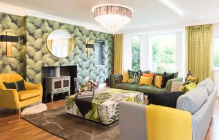 Contemporary living room with chimney breast with patterned wallpaper 