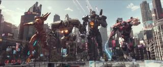 Giant Jaeger mechs battle giant monsters in "Pacific Rim: Uprising." The movie will hit theaters in March 2018.