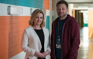 PAUL NICHOLLS as Steve Bell and JO JOYNER as Mandy Carter