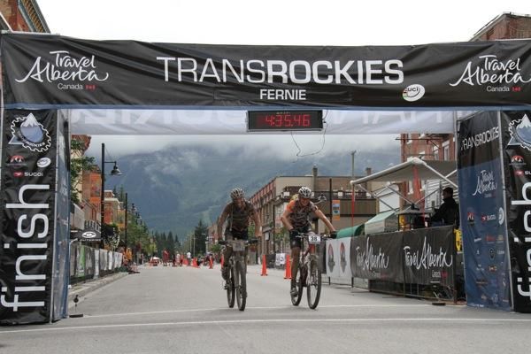 Open Men&rsquo;s winners Barry Wicks (right) and Kris Sneddon cross the line in Fernie, British Columbia.
