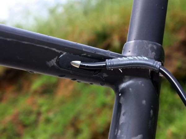 A removable rear brake housing stop should make for easier routing through the top tube.