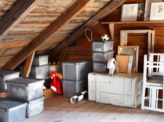 A loft filled with plastic storage container boxes