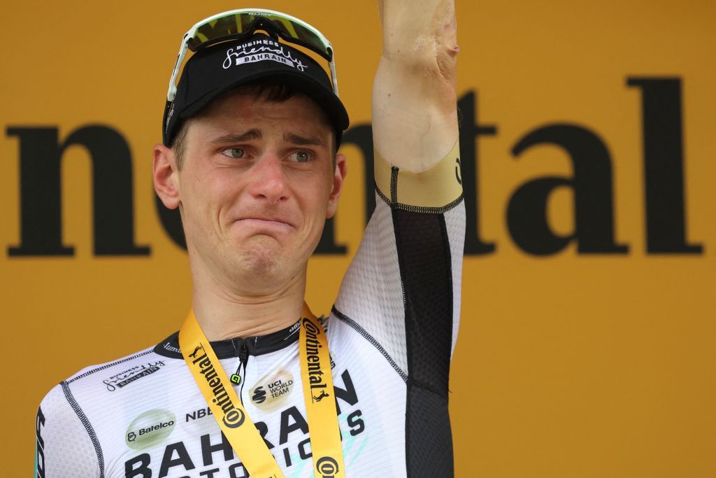 Bahrain Victorious Slovenian rider Matej Mohoric celebrates his victory on the podium after winning the 19th stage of the 110th edition of the Tour de France cycling race 173 km between MoiransenMontagne and Poligny in the Jura department of centraleastern France on July 21 2023 Photo by Thomas SAMSON AFP Photo by THOMAS SAMSONAFP via Getty Images